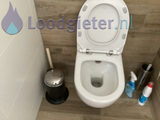 Loodgieter Verstopping WC Blokje verwijderen uit toiletpot