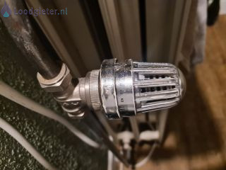 Loodgieter Thermostaat Thermostaatknop blokverwarming uit zetten.