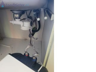 Loodgieter Boiler aansluiten Close in boiler aansluiten.